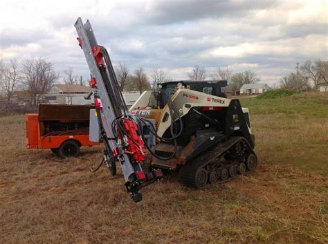 rotary drill skid steer|skid steer rock drill attachments.